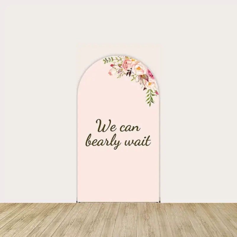 Middle arch panel with soft pink background, floral corner accents, and elegant script reading “We Can Bearly Wait”—ideal for baby shower décor.