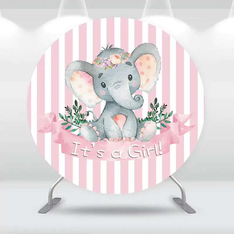 Round pink striped backdrop with a cute elephant and "It's a Girl!" text, ideal for baby showers.