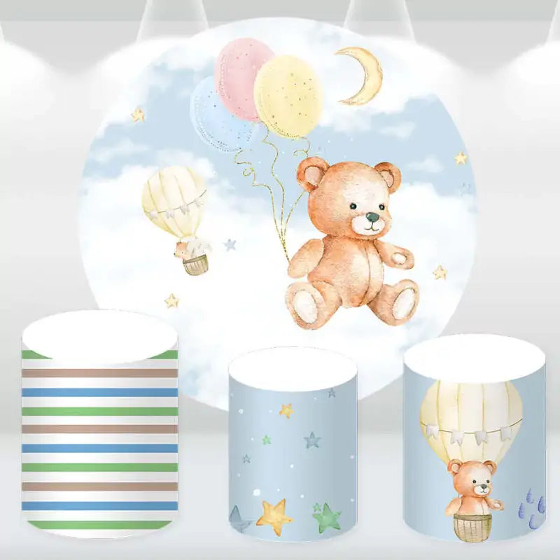 Charming party decor set featuring a Teddy Bear backdrop and matching cylinder covers with playful designs.