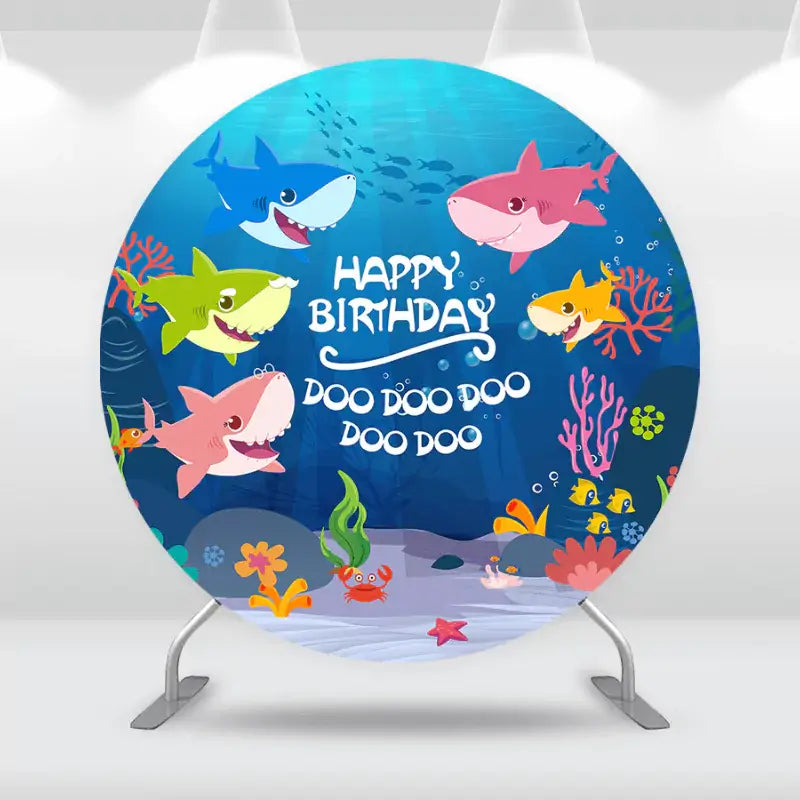 Baby Shark-themed birthday backdrop with colorful ocean scene and “Happy Birthday Doo Doo Doo” message.