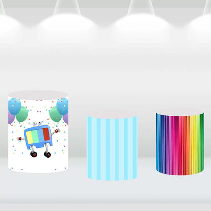 Party cylinder covers with rainbow, striped, and balloon designs, perfect for a cartoon-themed celebration.