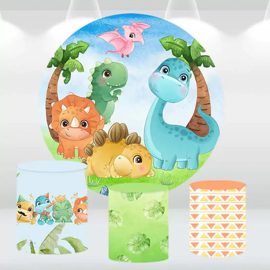 Adorable dino party decor set with a colorful backdrop and cylinder covers with dino and tropical designs, perfect for kids' celebrations.