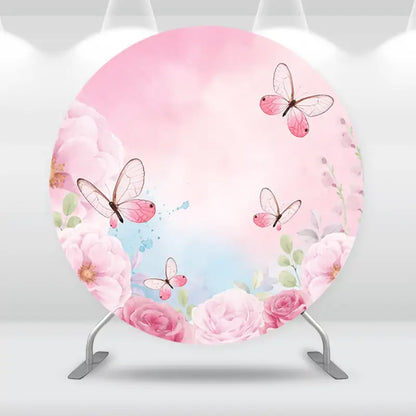 Butterfly and floral-themed round backdrop with soft pink flowers and delicate butterflies, ideal for creating a beautiful event atmosphere.