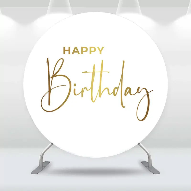 Round birthday backdrop with gold script 'Happy Birthday' text on a minimalist white background.