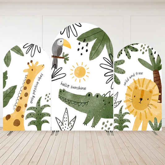 A set of jungle animal-themed arched backdrops featuring a giraffe, crocodile, lion, and toucan, surrounded by tropical greenery and playful text like ‘hello sunshine’ and ‘wild and free.’