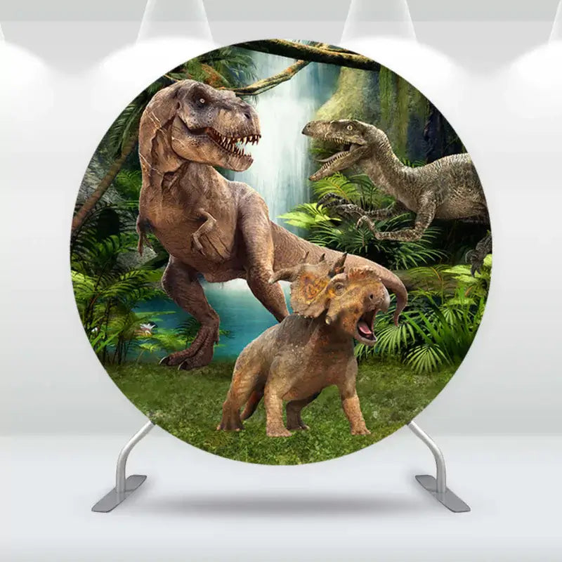 Round dinosaur-themed backdrop featuring a T-Rex and velociraptor in a jungle, perfect for kids' dinosaur-themed parties.