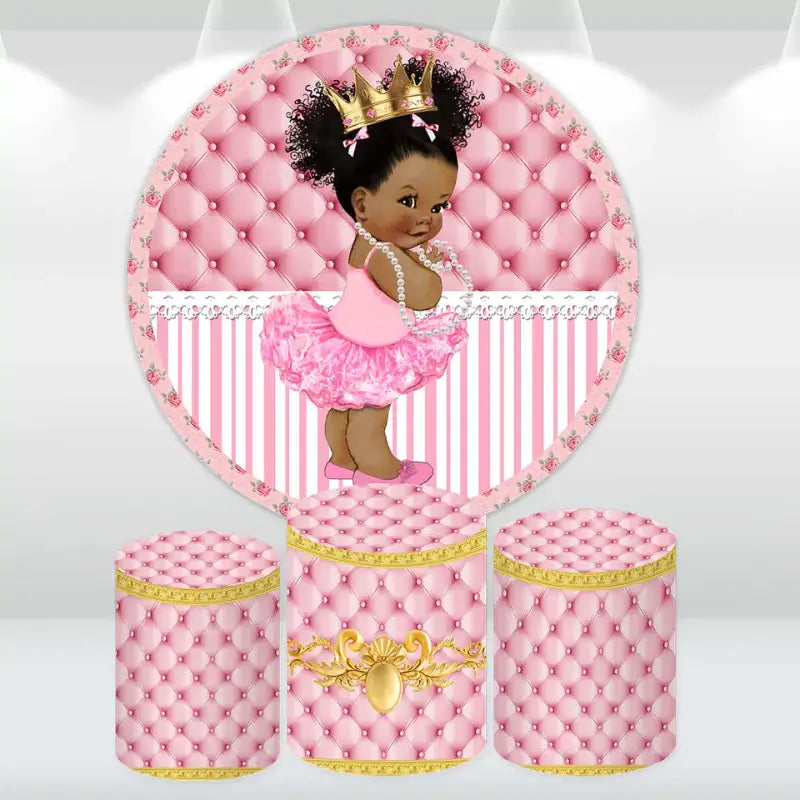 Royal princess-themed baby shower decor set with a pink tufted backdrop and matching cylinder covers, featuring a princess in a tutu with a crown and pearls.