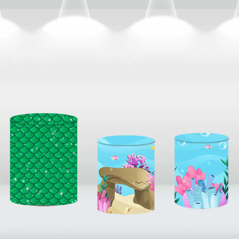 Mermaid-themed cylinder covers, including designs with green scales, coral reefs, and ocean floor elements.