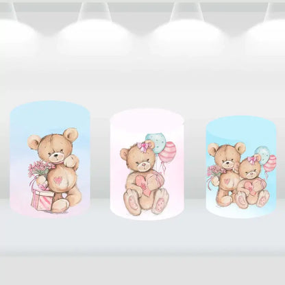 Set of three cylinder covers featuring teddy bear designs with balloons and hearts, matching the teddy bear-themed party backdrop.