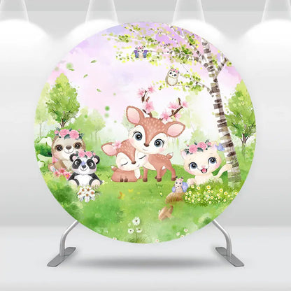 Forest animal theme backdrop for baby shower or children's party with woodland critters and greenery.