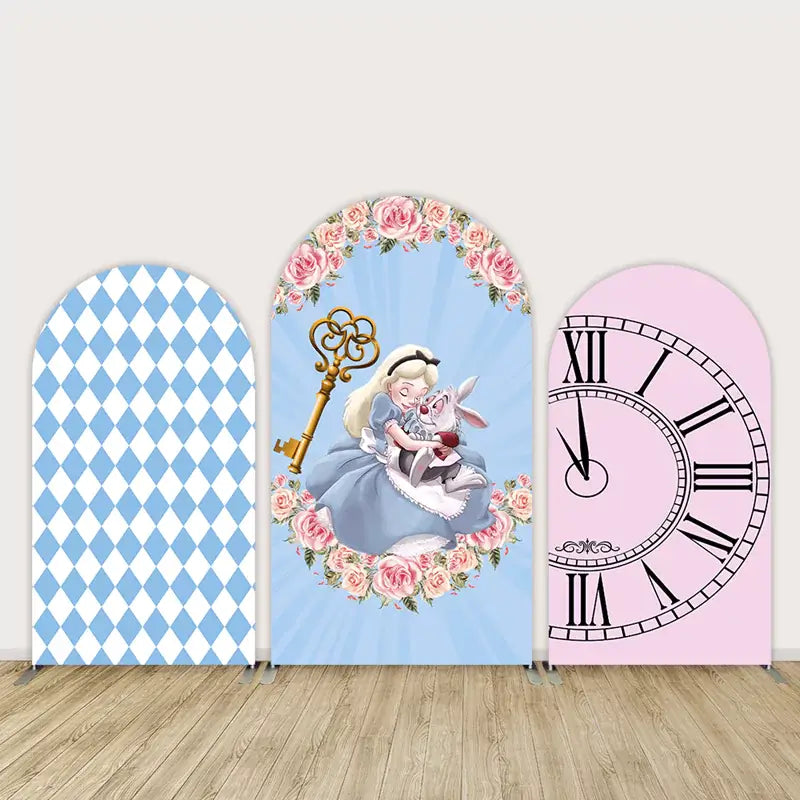 Three-panel Alice in Wonderland-themed arch backdrop set featuring Alice with the White Rabbit, pink clock face, blue diamonds, and floral elements.