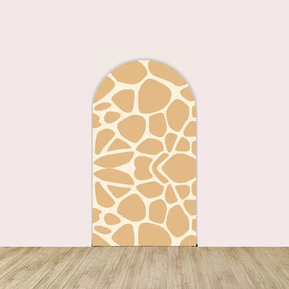 Beige and brown giraffe pattern arched backdrop, ideal for safari or animal-themed parties.