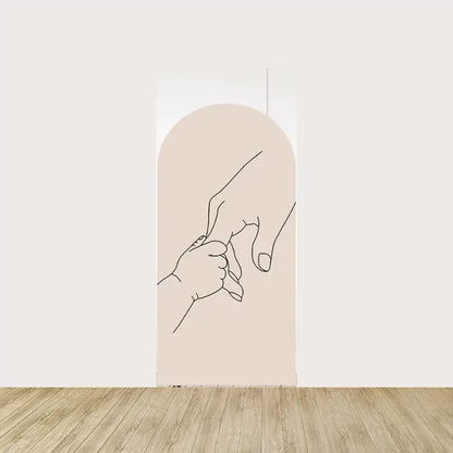 Arch panel with delicate line art of a baby holding an adult finger—symbolizing maternal connection and love.