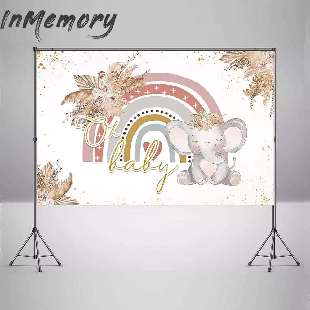 Cute and engaging elephant-themed baby shower backdrop with a rainbow and golden splatters, designed to create a warm and inviting atmosphere.