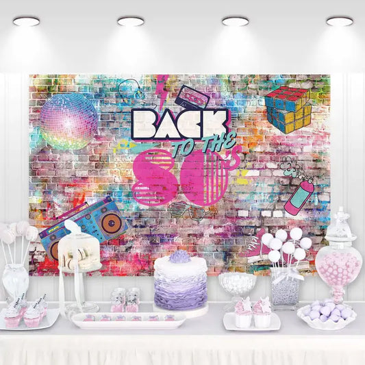 Back to the 80s themed backdrop with vibrant colors, graffiti style, cassette tapes, disco ball, and Rubik's cube – perfect for retro-themed parties