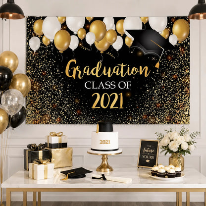 Black and gold Graduation Class of 2021 backdrop with balloons, glitter confetti and graduation cap design for a graduation party.