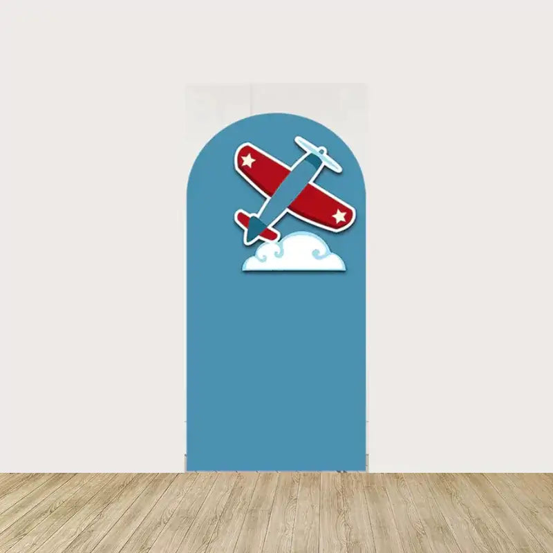 Arch panel with a blue background, red and blue airplane soaring over clouds—fun decor for aviation birthday or first flight-themed celebrations.