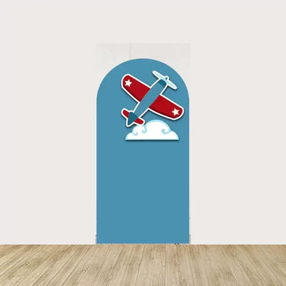 Arch panel with a blue background, red and blue airplane soaring over clouds—fun decor for aviation birthday or first flight-themed celebrations.