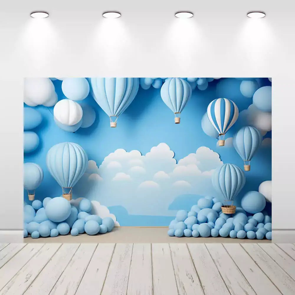 Blue sky backdrop with hot air balloons and clouds for baby shower or kids’ party.