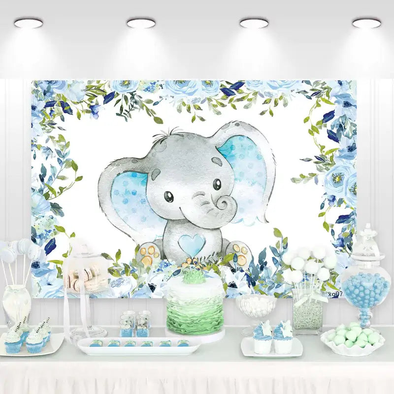 Watercolor elephant birthday backdrop with blue floral border and cute baby elephant illustration – perfect for baby boy’s first birthday or baby shower.