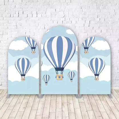 Three-panel backdrop featuring blue and white hot air balloons floating in the sky with fluffy clouds—ideal for baby showers or sky-themed parties.