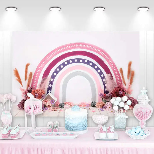 Boho-style pink and purple rainbow backdrop with dried flowers, pampas grass, and soft wood floor – perfect for baby showers or girls' birthday parties