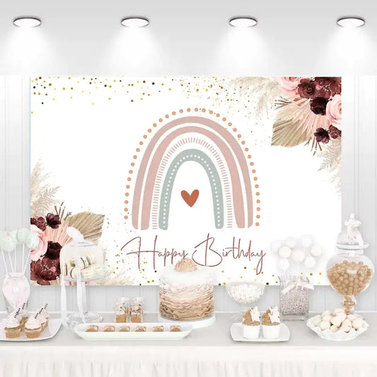 Boho rainbow birthday backdrop with earthy pastel tones, dried florals, gold sparkles, and ‘Happy Birthday’ script – perfect for a stylish celebration.