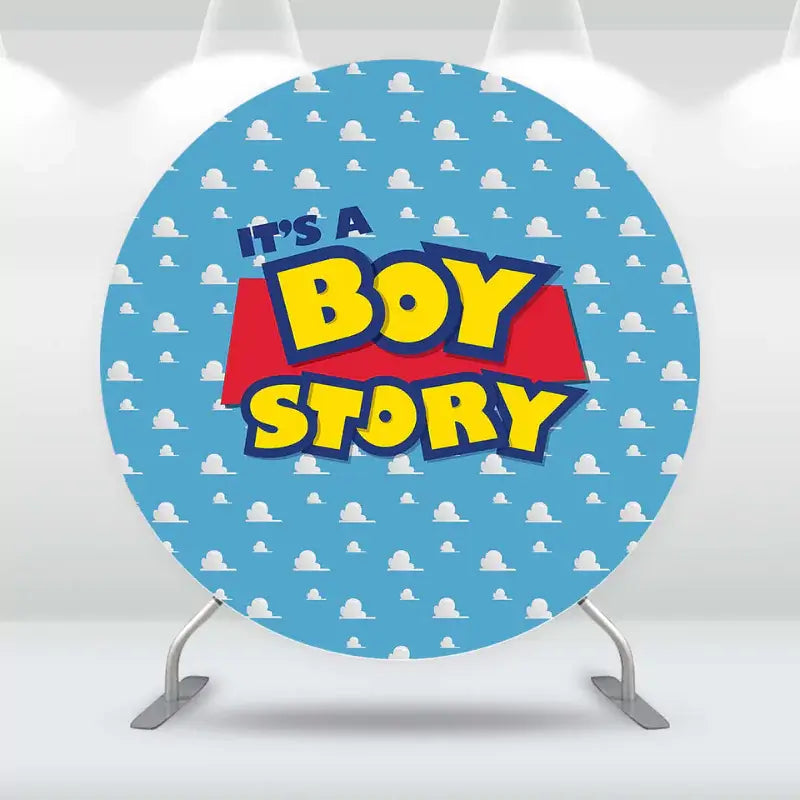 It's a Boy Story themed round backdrop with playful blue and white cloud pattern.