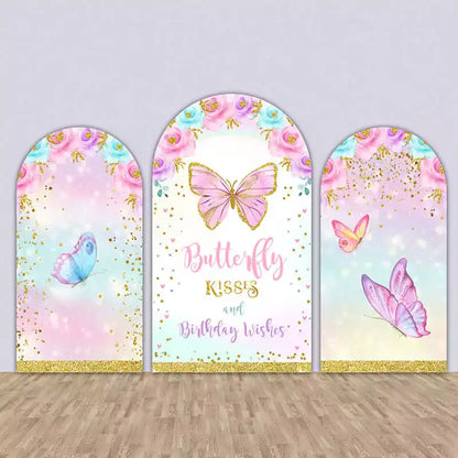 Set of three butterfly-themed arched backdrops with pastel colors, floral designs, and glitter accents, perfect for birthday parties.