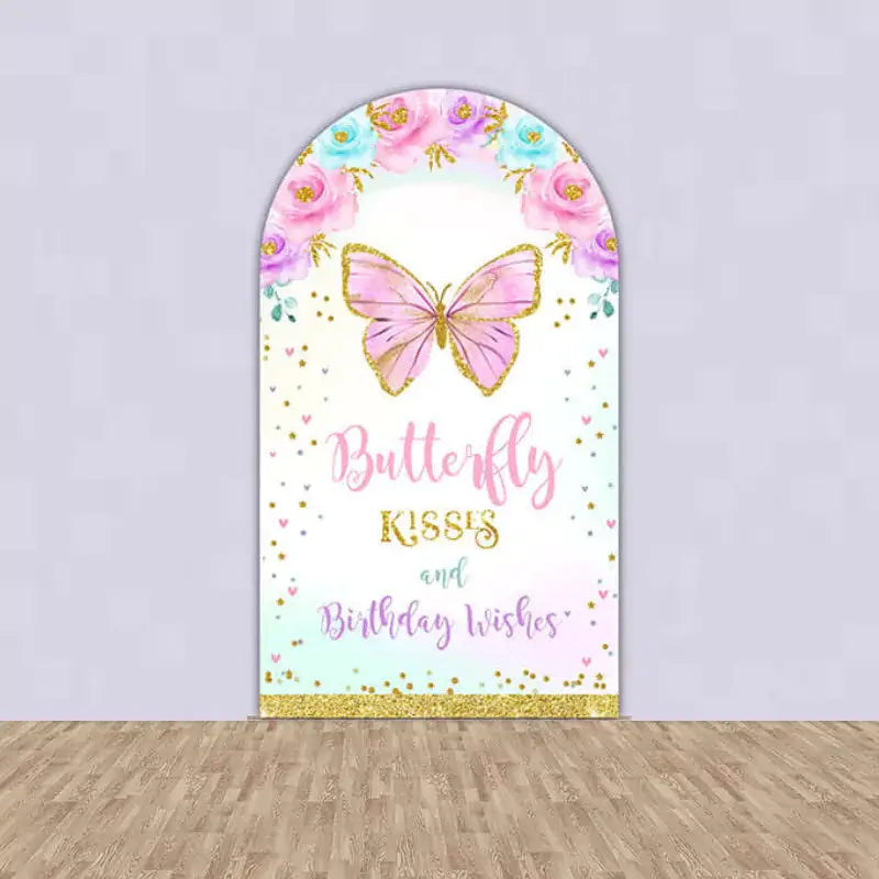 Tall central arch backdrop with a pink butterfly, floral designs, and the text 'Butterfly Kisses and Birthday Wishes,' ideal for birthday celebrations.