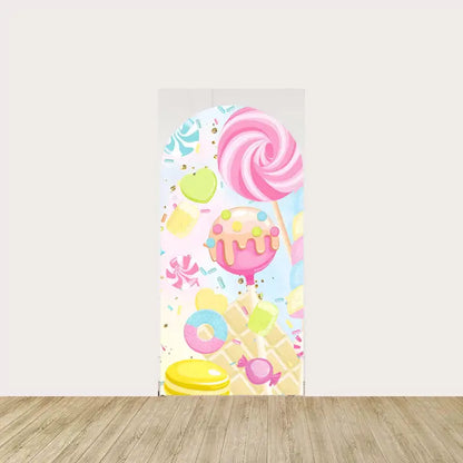 Arch backdrop with a variety of candies, including lollipops, gumdrops, and sweets, in pastel colors—perfect for a candy-themed birthday party.