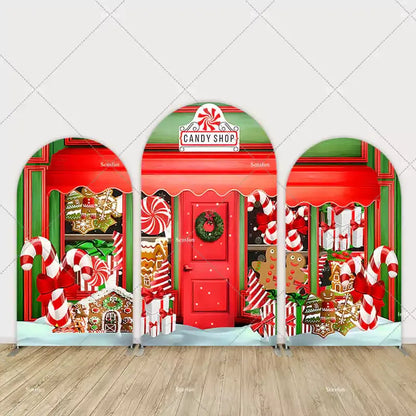 Three-piece arch wall backdrop depicting a red and green candy shop with candy canes, gingerbread cookies, and peppermint decorations.