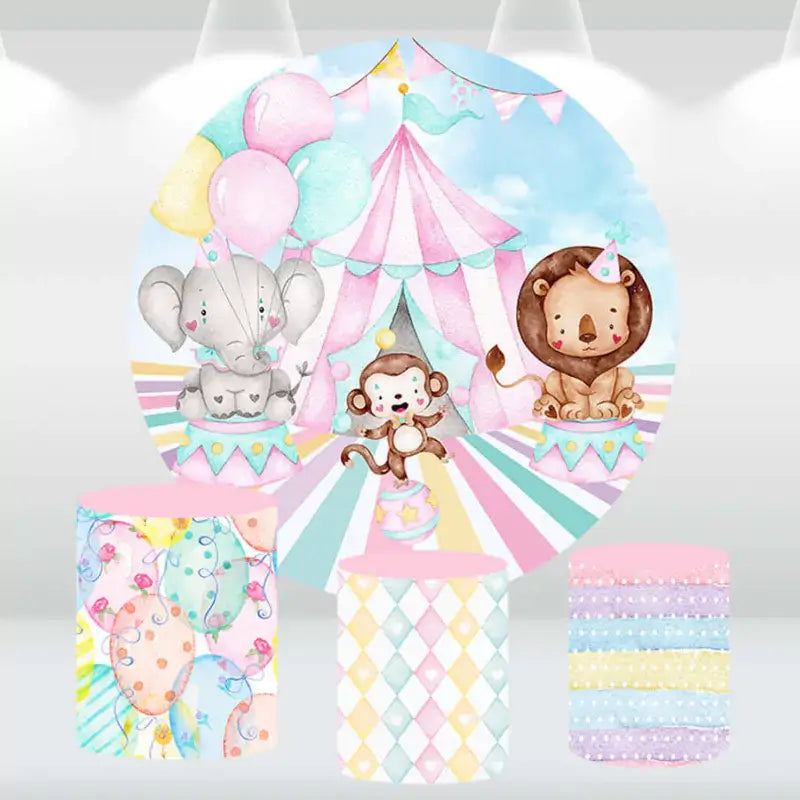 Circus-themed round backdrop with an elephant, monkey, and lion, paired with three matching cylindrical pedestal covers featuring balloon, diamond, and pastel designs.