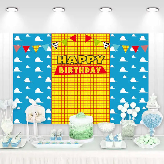 Colorful birthday backdrop with banners and bright yellow and blue design, perfect for kids' birthday parties.