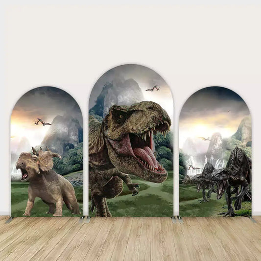Three-piece dinosaur arch backdrop featuring a roaring T-Rex, Triceratops, raptors, jungle background, and flying pterosaurs in a dramatic scene.