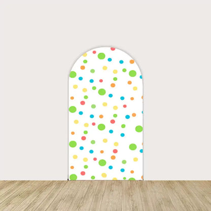 White backdrop with multicolored polka dots, complementing the dinosaur theme with a bright and cheerful design.