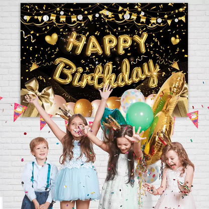 Luxurious black and gold themed birthday backdrop adorned with balloons, streamers, and a shimmering 'Happy Birthday' message.