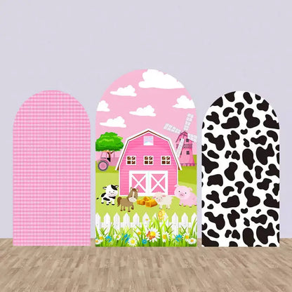 Set of three farm-themed arched backdrops featuring a pink gingham pattern, a pink barn with animals, and a black and white cow print, ideal for a farm-themed birthday party.