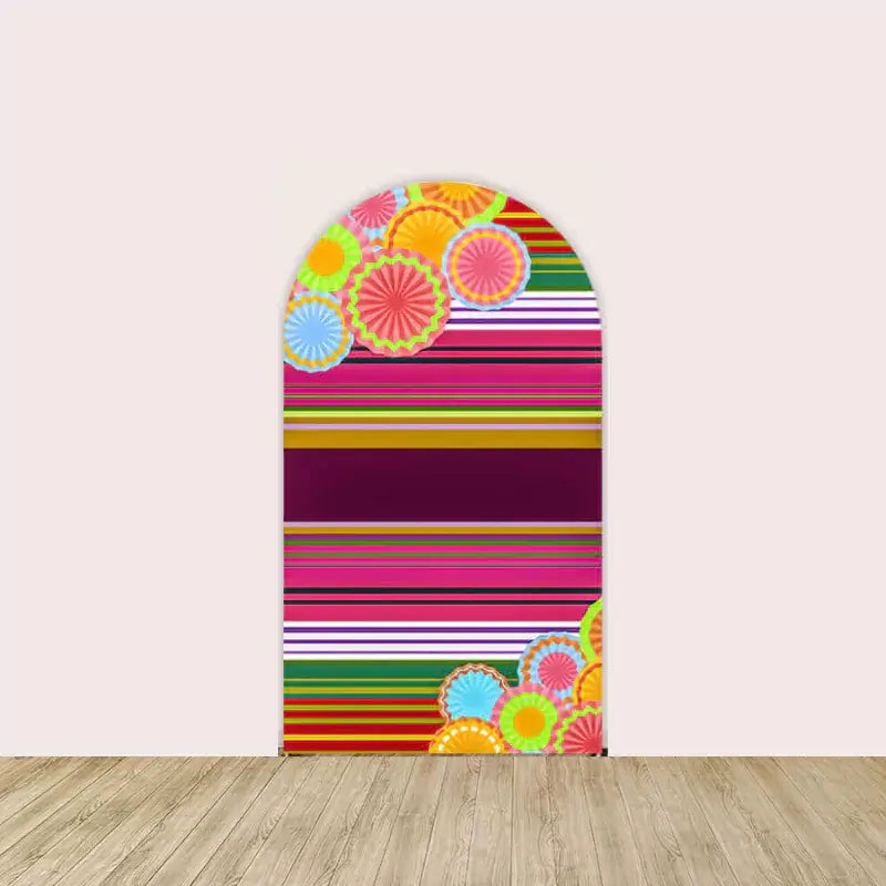 Backdrop with multicolored stripes and circular floral designs, bringing a vibrant Mexican fiesta theme to any event.