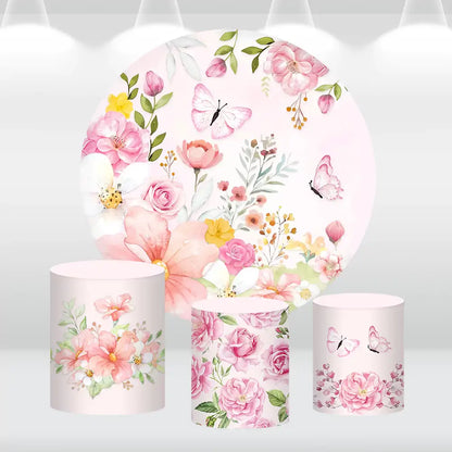 Floral butterfly-themed round backdrop with pastel flower designs and matching cylinder covers, perfect for baby showers, weddings, or elegant celebrations.