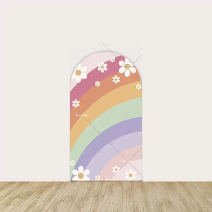 Pastel rainbow with white daisies on a pink background.