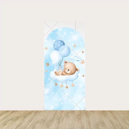 Arch panel featuring a teddy bear with blue balloons floating on a cloud surrounded by golden stars—perfect for a boy gender reveal party.