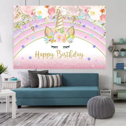 Pink unicorn birthday backdrop with watercolor florals, glitter horn, stars, and Happy Birthday message – great for girls' parties.