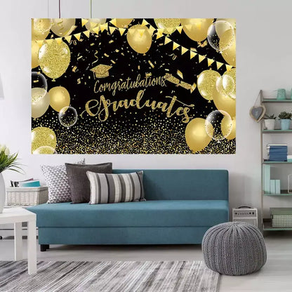 Graduation backdrop with "Congratulations Graduates" in gold glitter, surrounded by balloons and banners, ideal for a festive graduation party