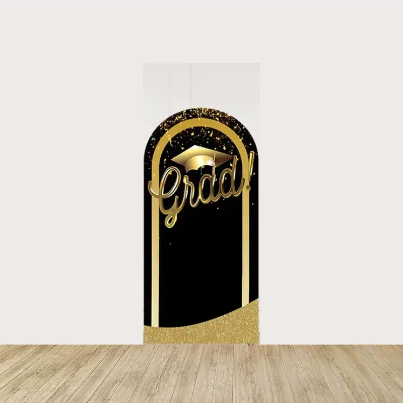 Black background with the word “Grad!” in large, gold script and a golden arch, enhancing the celebratory graduation theme.
