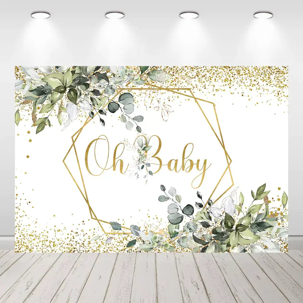 Elegant baby shower backdrop with greenery, gold accents, and "Oh Baby" text.