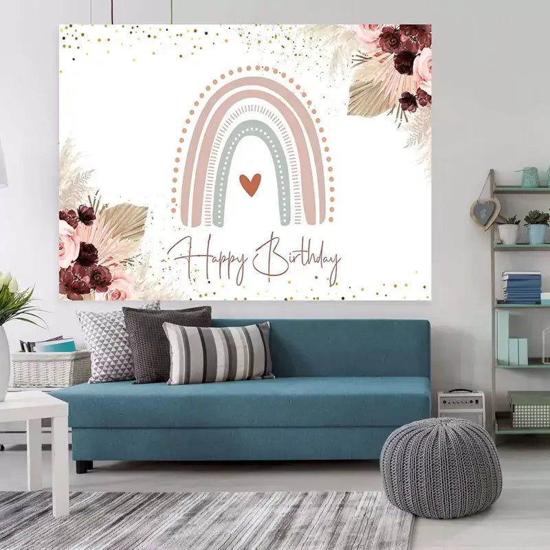 Neutral boho-themed birthday banner with a hand-drawn rainbow, heart accent, floral arrangements, and elegant typography.
