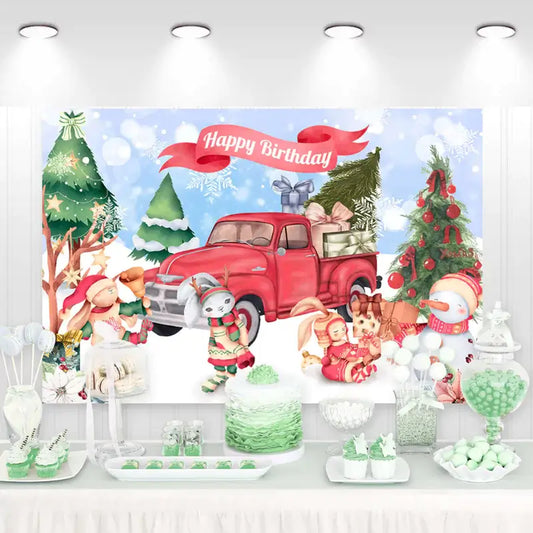 Whimsical winter-themed birthday backdrop featuring a red truck, Christmas trees, and festive characters, ideal for seasonal birthday parties.