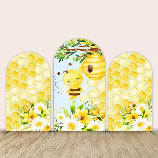 Charming honey bee-themed backdrop with honeycomb, bee, and floral accents, perfect for a baby shower or first birthday celebration.