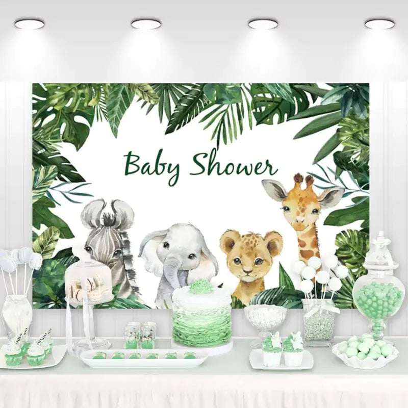 Elegant baby shower backdrop decorated with illustrations of baby jungle animals including an elephant, giraffe, lion, and zebra, set against a lush tropical leaf background.